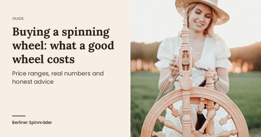 Buying a spinning wheel: Kromski Minstrel spinning wheel in natural wood in a meadow